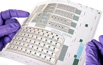 Printed electronics: Transistors scaled up to system-level prototypes